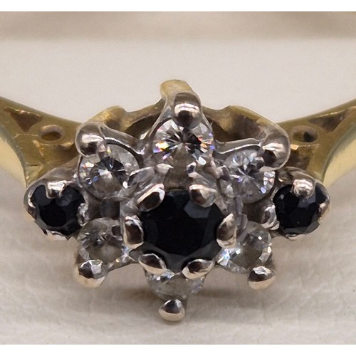 43 - 18ct yellow gold, blue topaz and diamond stone ring. 2.36grams. Ring size P.