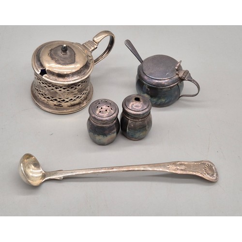 49 - A Selection of silver wares; Chester silver four slice toast rack- produced by Nathan & Hayes. Birmi... 