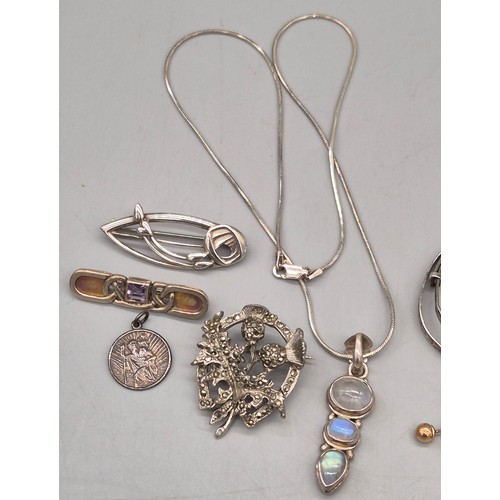 53 - A Collection of silver jewellery and gold stud earrings. Ola M Gorie silver Mackintosh rose brooch, ... 