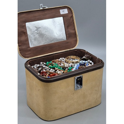 47 - Jewellery box and contents; Two 9ct metal core bangles, various costume necklaces and other items.