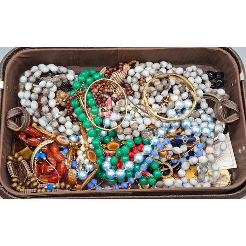 47 - Jewellery box and contents; Two 9ct metal core bangles, various costume necklaces and other items.