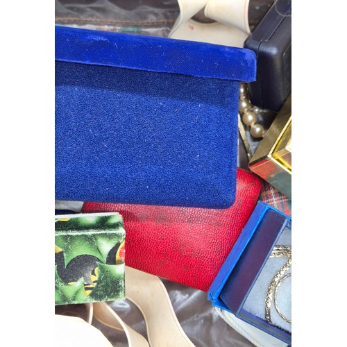 47 - Jewellery box and contents; Two 9ct metal core bangles, various costume necklaces and other items.