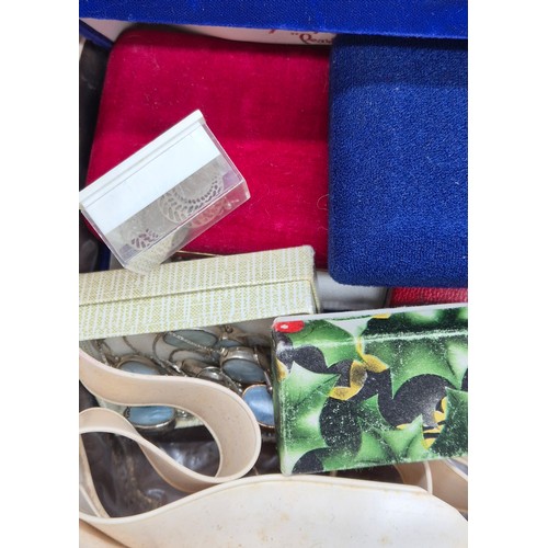 47 - Jewellery box and contents; Two 9ct metal core bangles, various costume necklaces and other items.