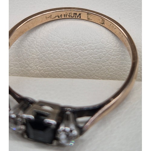 56 - 1940's 9ct yellow gold, Platinum, blue topaz and diamond stone ring. Emerald cut blue topaz centre s... 