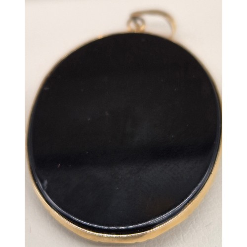 60 - 14ct yellow gold, onyx and Australian opal gem stone cameo carved pendant.