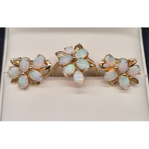 58 - 14ct yellow gold and Australian Opal gem stone ring and matching earrings. 7.82grams. Ring size N.