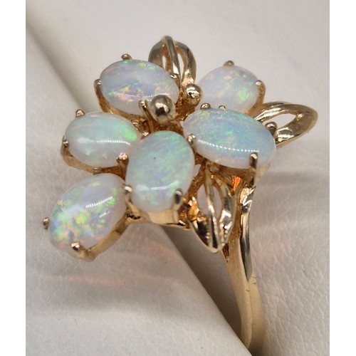 58 - 14ct yellow gold and Australian Opal gem stone ring and matching earrings. 7.82grams. Ring size N.