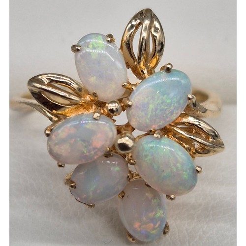 58 - 14ct yellow gold and Australian Opal gem stone ring and matching earrings. 7.82grams. Ring size N.