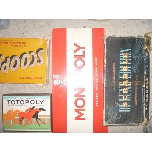 211 - 4 board games including monopoly , scrabble etc