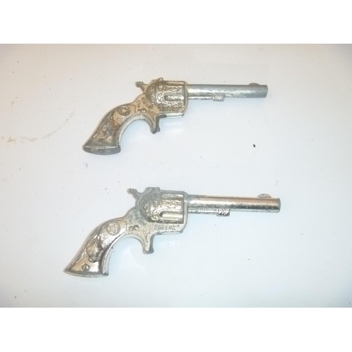 46 - 2 lone star cap guns cowboy style, rim fire unchecked, with playwear and faults