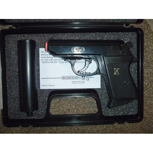 134 - walther ppk in case cap gun