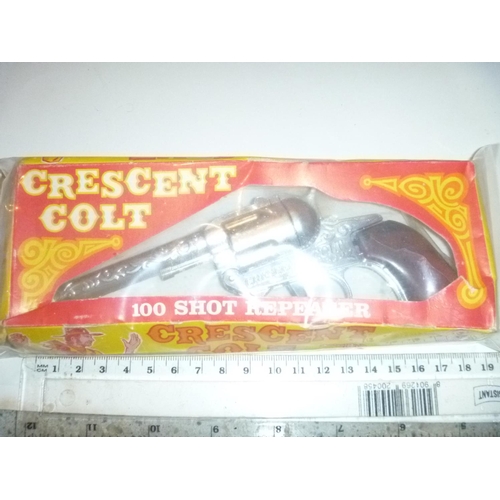 215 - crescent colt cap gun