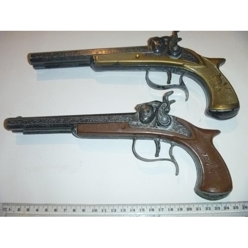 222 - 2 double barrelled pirate style cap guns both working crescent / lone star type