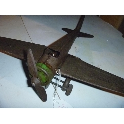 107 - early large Mettoy tinplate folded wing aircraft, body tarnished and rusty but model is solid and re... 