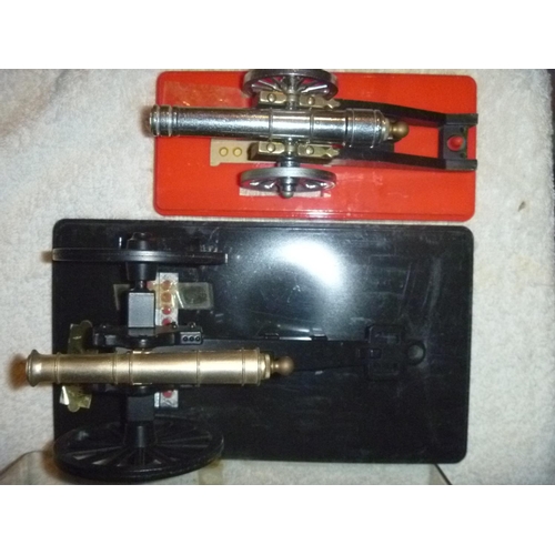 202 - two impressive toy canon in perspex cases italian