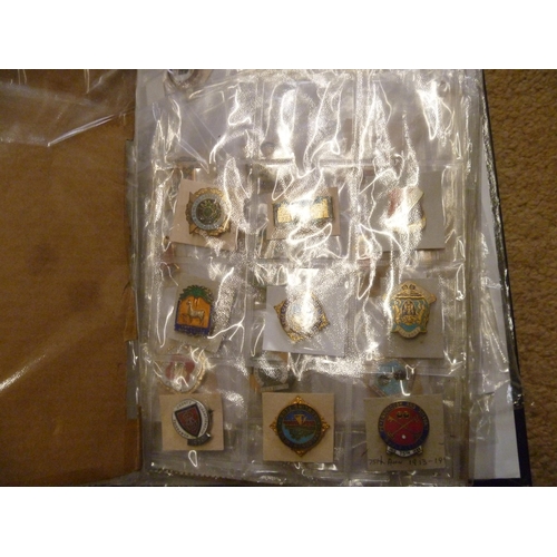 20 - 2 folders of enamelled badges.  Over 120 individual badges