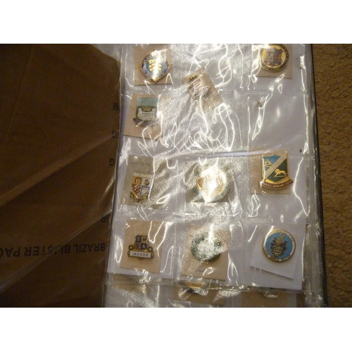 20 - 2 folders of enamelled badges.  Over 120 individual badges