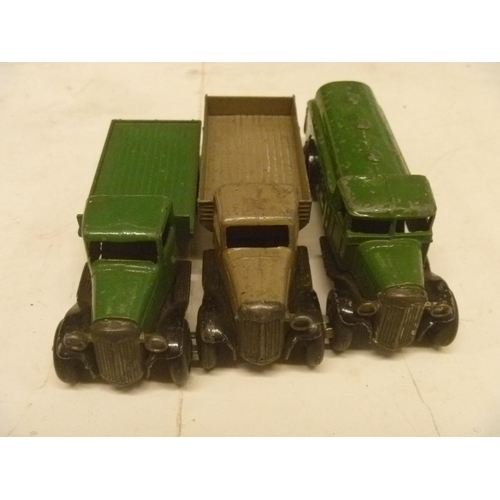 87 - 3 VINTAGE DINKY TOYS FLAT TRUCK PETROL TANKER WAGON AND TIPPER LORRY