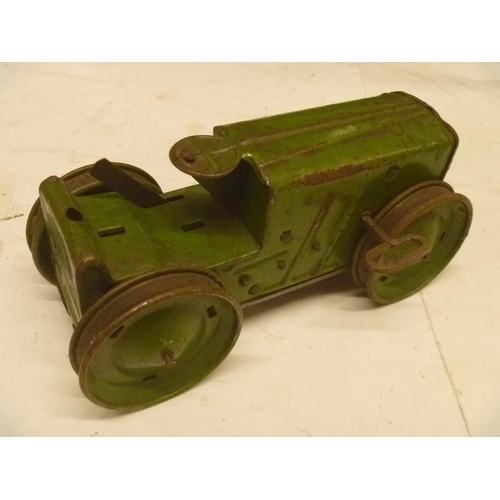 163 - 2 TINPLATE CLOCKWORK TRACTORS BY MARX, MOTORS RUN BUT WHEELS DO NOT ENGAGE PROPERLY AND SLIP