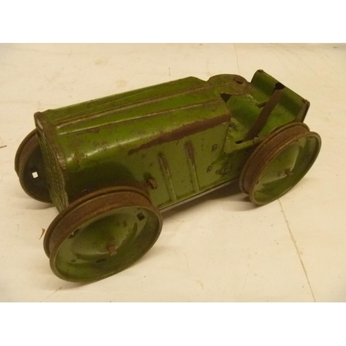 163 - 2 TINPLATE CLOCKWORK TRACTORS BY MARX, MOTORS RUN BUT WHEELS DO NOT ENGAGE PROPERLY AND SLIP