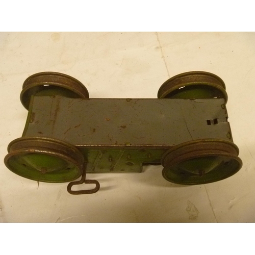 163 - 2 TINPLATE CLOCKWORK TRACTORS BY MARX, MOTORS RUN BUT WHEELS DO NOT ENGAGE PROPERLY AND SLIP