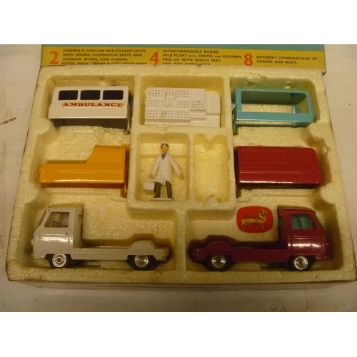 92 - CORGI TOYS BOXED COMMER CONSTRUCTOR SET, LACKS BENCH AND POLYSTYRENE BASE HAS BROWN TAPE AROUND IT'S... 