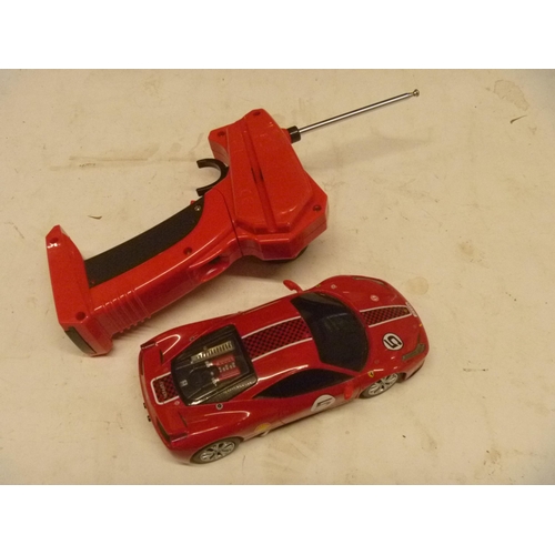 182 - RADIO CONTROLLED FERRARI WITH HANDSET BY QX (UNTESTED)