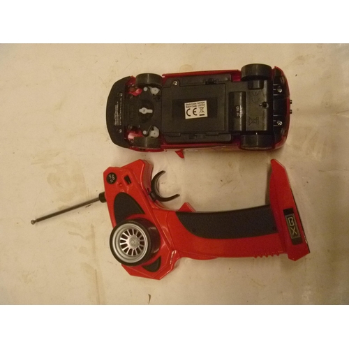 182 - RADIO CONTROLLED FERRARI WITH HANDSET BY QX (UNTESTED)