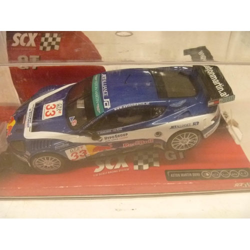 266 - SCX / SCALEXTRIC SLOT CAR - ASTON MARTIN DBR9 AND MINI COOPER (SLOT CARS HAVE BEEN REMOVED FROM THEI... 