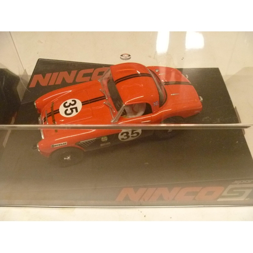 267 - NINCO JAGUAR E TYPE AND AUSTIN HEALEY (SLOT CARS HAVE BEEN REMOVED FROM THEIR BOXES AT SOME POINT BU... 