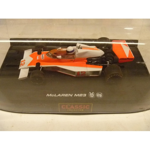 106 - SCALEXTRIC SLOT CAR - McLAREN M23 (SLOT CARS HAVE BEEN REMOVED FROM THEIR BOXES AT SOME POINT BUT MO... 