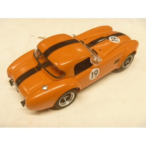 141 - MRRC SLOT CAR AC COBRA IN ORANGE - UNBOXED - CAREFUL LIGHT USE