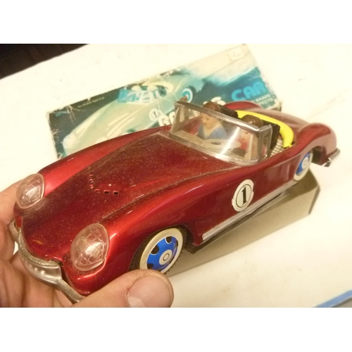 64 - TINPLATE RACING CAR CHINA