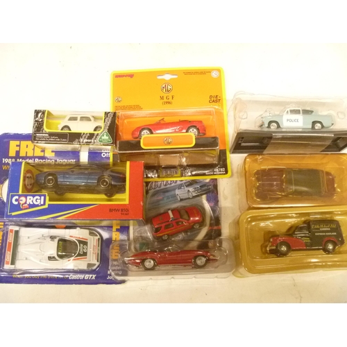 84 - PACKAGED VEHICLES LOT ANGLIA MORRIS JAGUAR CORGI BMW ETC