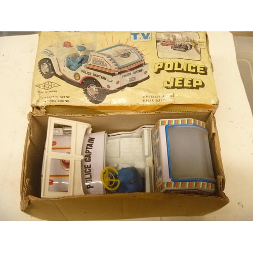 92 - TINPLATE BATTERY OPERATED POLICE JEEP TV BOXED MADE IN TAIWAN KUNG HUI