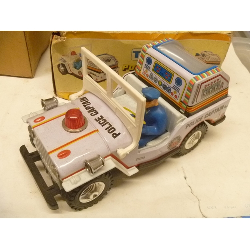 92 - TINPLATE BATTERY OPERATED POLICE JEEP TV BOXED MADE IN TAIWAN KUNG HUI