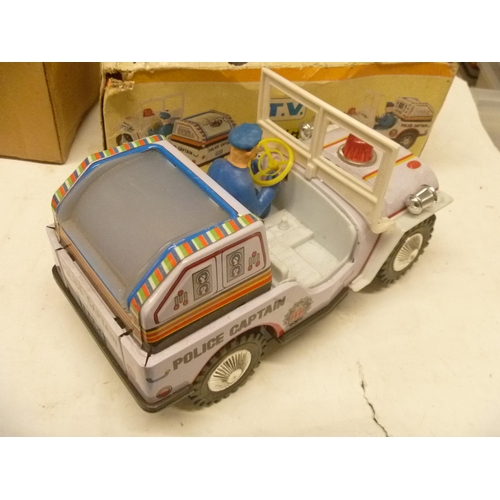 92 - TINPLATE BATTERY OPERATED POLICE JEEP TV BOXED MADE IN TAIWAN KUNG HUI