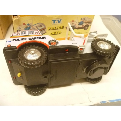 92 - TINPLATE BATTERY OPERATED POLICE JEEP TV BOXED MADE IN TAIWAN KUNG HUI