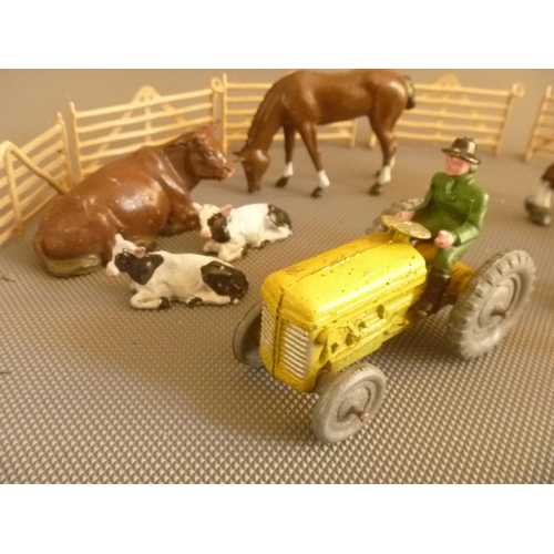 137 - NICE GROUP OF VINTAGE BRITAINS LEAD ANIMALS, FARMER AND FENCES T/W DIECAST TRACTOR