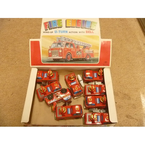 12 - VINTAGE TT TOYS OF JAPAN TINPLATE CLOCKWORK FIRE ENGINES CONTAINED IN ORIGINAL TRADE COUNTER SHOP DI... 