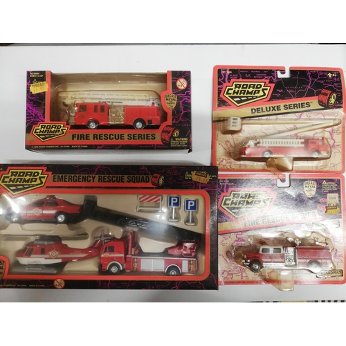 4 ROAD CHAMPS FIRE SERVICE RELATED MODELS, (BOXES HAVE VARYING DEGREES OF SMOKE RESIDUE WHICH CAN MOSTLY BE CLEANED OFF WITH EASE USING WARM WATER, RANDOM INSPECTION SUGGESTS THAT CONTENTS ARE GENERALLY EXCELLENT UNUSED CONDITION AND UNAFFECTED BY THE RESIDUE)