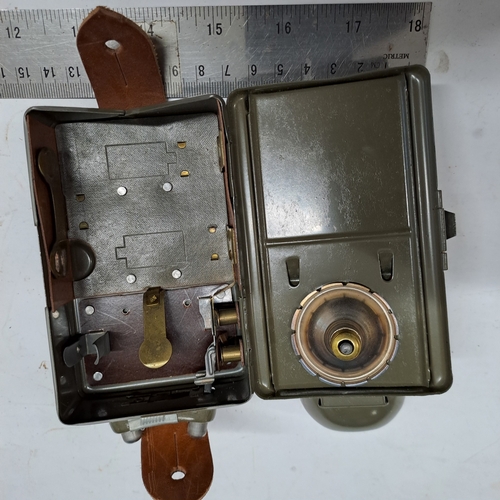 26 - vintage WORLD WAR 2 �military field flashlight,�Features sliding mechanisms on the front to place di... 