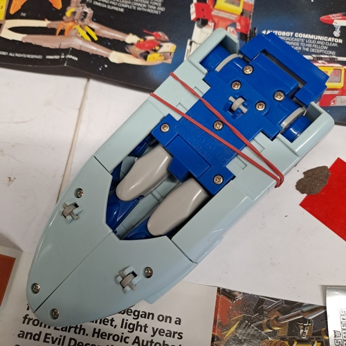 45 - 1986 Hasbro / Takara Transformers Decepticon G1 Scourge�action figure with some associated paperwork