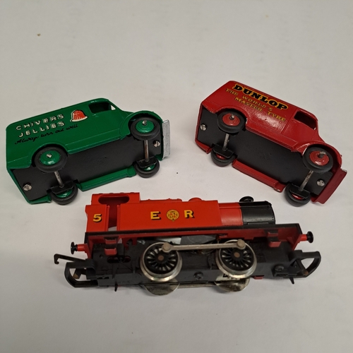31 - 2 WHITE METAL POSSIBLY DGM DINKY TOYS COPIES OF TROJAN VANS PLUS A HORNBY LOCOMOTIVE
