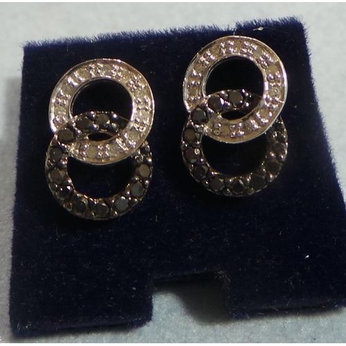 202 - Pair of White Gold Black and White Diamond Ear Rings