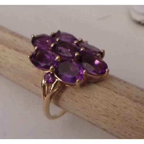 36 - 9ct. Amethyst Cluster Ring