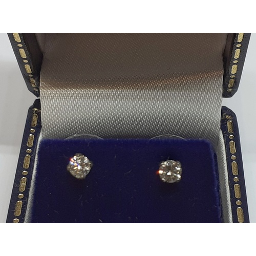 33 - White Gold Diamond Stud Earrings