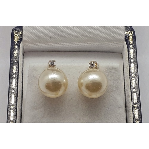 35 - Pair 14 carat Pearl Earrings