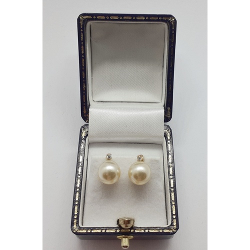 35 - Pair 14 carat Pearl Earrings