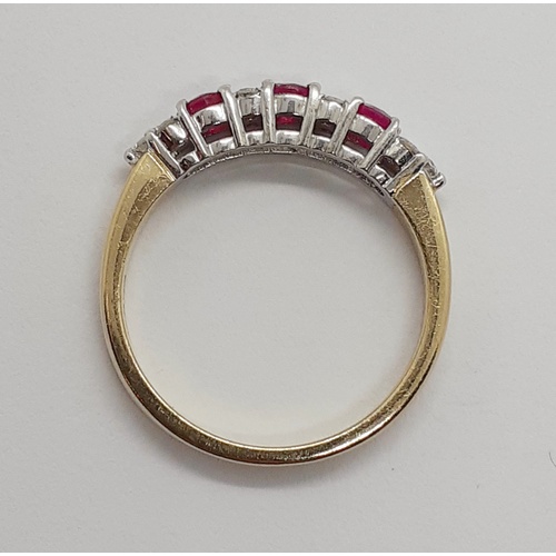 205 - 9ct Diamond & Ruby Eternity Ring.  Size: L 1/2